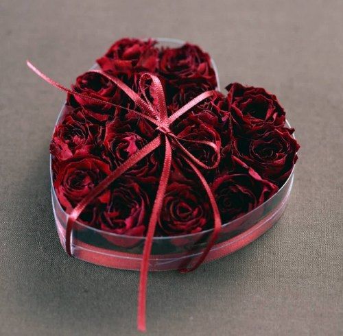 Imagen un corazon con rosas