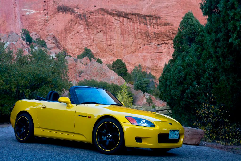 IMAGE: http://i298.photobucket.com/albums/mm273/FocsrallyX/My%20Car%20Pics/CloseRedrockfrontquarter.jpg