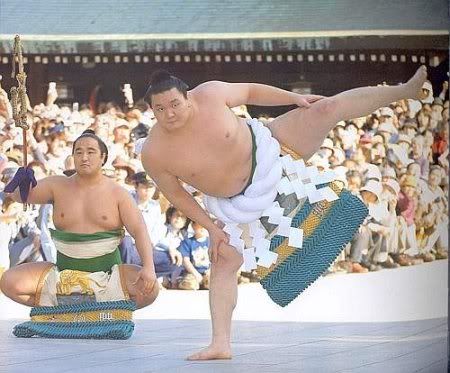27. SUMO - Mongolian wrestler Hakuho dances to celebrate his promotion to Yokozuna, the highest ranking in the sport of Sumo.