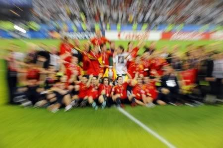 The Spanish team poses with the Euro 2008 championships trophy after winning the final football match over Germany on June 29, 2008 at Ernst-Happel stadium in Vienna, Austria. Spain ended their 44-year wait for a major international title with a 1-0 victory over Germany at the Euro 2008 final. (AFP/Getty Images)