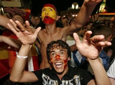 Spanish supporters celebrate while watching the Euro 2008 championships final football match Germany vs. Spain on June 29, 2008 in Vienna's 