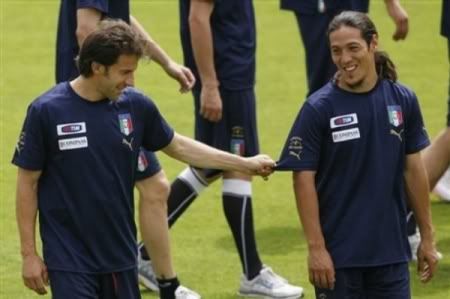Italian players Alessandro del Piero, left, and Mauro German Camoranesi joke during a training session in Coverciano, near Florence, Italy, Wednesday, May 28, 2008, in view of the upcoming soccer Euro 2008 in Austria and Switzerland. (AP Photo by LORENZO GALASSI)