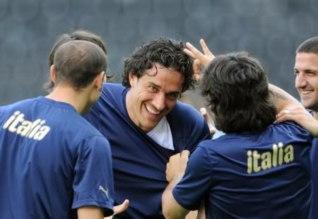 Italy's striker Luca Toni (C) jokes with teammates during a training session of the Italian national football team at Ernst Happel stadium in Vienna on June 21, 2008. Italy will face Spain in the quarter-final of the Euro 2008 football tournament on June 22, 2008 at Ernst Happel stadium in Vienna. (AFP/Getty Images)