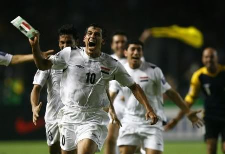 SOCCER - Iraq’s captain Younis Mahmoud celebrates after he scored against Saudi Arabia, which led the team to win their final match at the 2007 AFC Asian Cup soccer tournament at the Gelora Bung Karno stadium in Jakarta July 29, 2007. REUTERS/Jerry Lampen (INDONESIA)