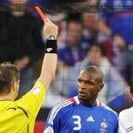 Slovak referee Michel L'ubos (L) hands a red card to French defender Eric Abidal (C) next to midfielder teammate Claude Makelele (R) during the Euro 2008 Championships Group C football match France vs. Italy on June 17, 2008 at the Letzigrund stadium in Zurich. (AFP/Getty Images)