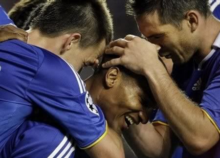 Chelsea's Florent Malouda, center, celebrates scoring against Bordeaux with his teammates, captain, John Terry, left, and Frank Lampard during their Champions League Group A soccer match at Stamford Bridge stadium in London, Tuesday Sept. 16, 2008. Chelsea won the match 4-0.